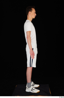  Johnny Reed dressed grey shorts sneakers sports standing white t shirt whole body 0007.jpg